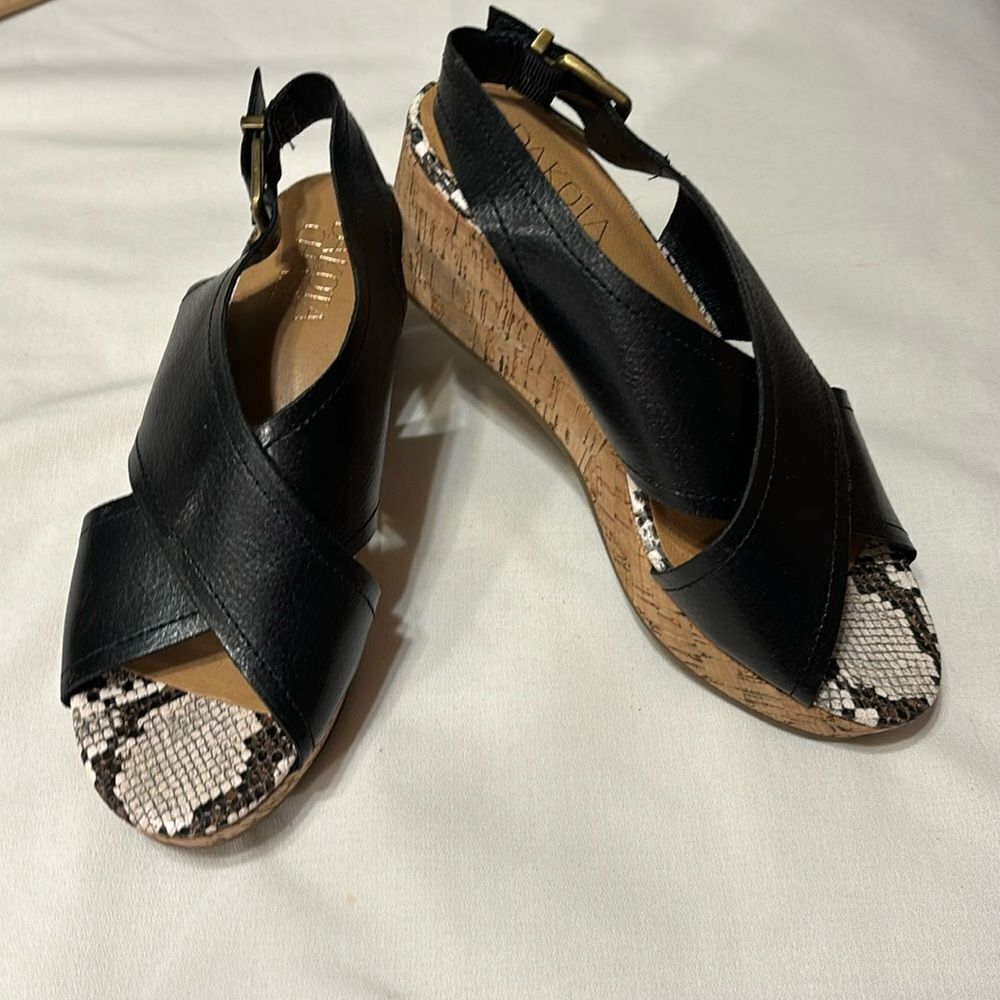 Dakota Chase size 6.5 open so platform wedge sandal.  Worn once inside only